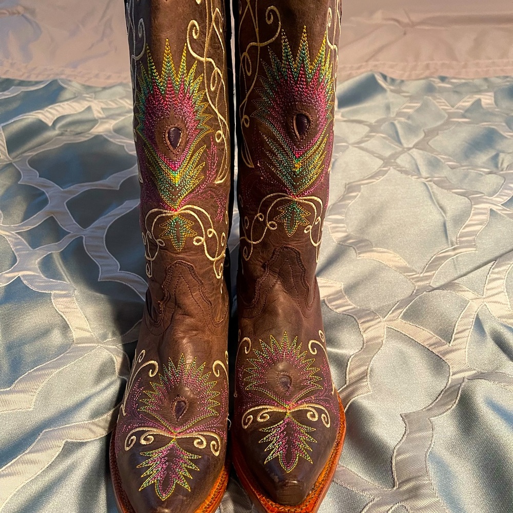 Tony Lama snip toe boots.